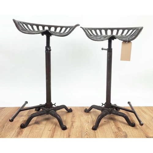 498 - STOOLS, a set of eight tractor seat style, height adjustable, 81cm H at tallest approx, with adjusta... 