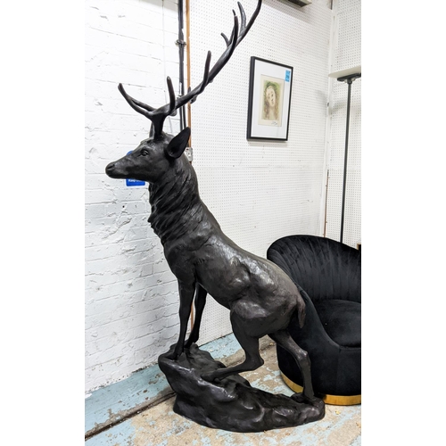 502 - SCULPTURAL STAGS, a pair, cast metal, 200cm H each. (2)