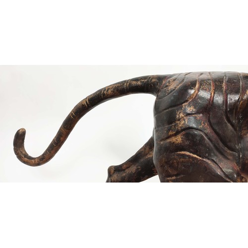 503 - SCULPTURAL TIGERS, a pair, cast metal. 62cm high, 120cm wide, 40cm deep (2)