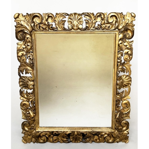 152 - FLORENTINE WALL MIRROR, 19th century Italian Florentine carved giltwood cushion pierced frame and be... 