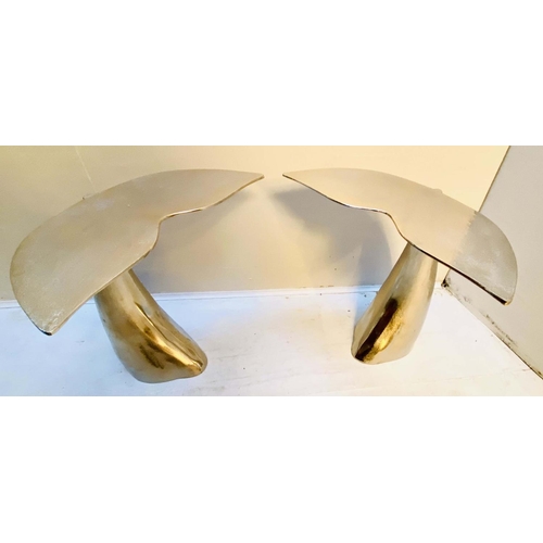 507 - SIDE TABLES, a pair, 55cm high, 54cm wide, 44cm deep, in the form of whale tails polished metal. (2)