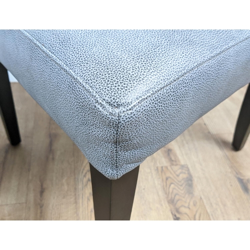 516 - DINING CHAIRS,  a set of six, in a textured grey leather upholstery, 102cm H each.