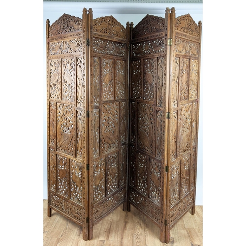 146 - INDIAN STYLE FLOOR SCREEN, four fold, each panel 50cm W x 185cm H, carved and pierced hardwood.