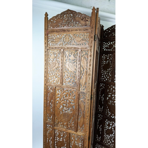 146 - INDIAN STYLE FLOOR SCREEN, four fold, each panel 50cm W x 185cm H, carved and pierced hardwood.