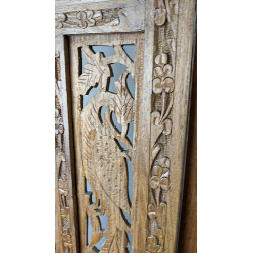 146 - INDIAN STYLE FLOOR SCREEN, four fold, each panel 50cm W x 185cm H, carved and pierced hardwood.