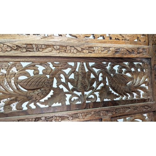 146 - INDIAN STYLE FLOOR SCREEN, four fold, each panel 50cm W x 185cm H, carved and pierced hardwood.