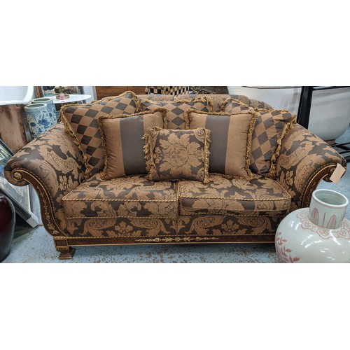 133 - SOFA, 103cm x 91cm H x 210cm, in a Damask fabric with carved showframe and gilt detail.