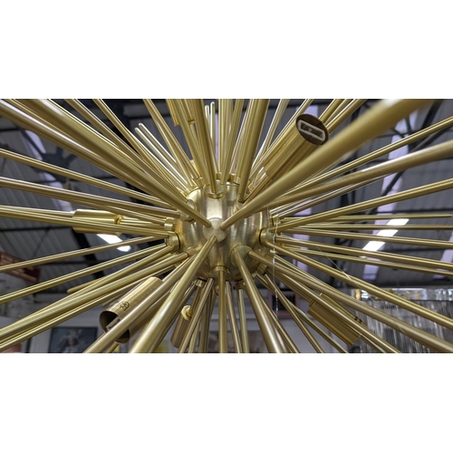 333 - CHANDELIER, 1970's Italian style, gilt metal, nine branch, 65cm diam.