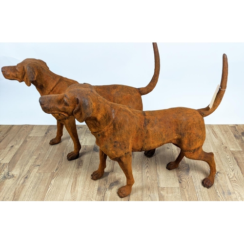 305 - CONTEMPORARY SCHOOL SCULPTURAL DOGS, a pair, cast metal, oxidised finish, 91cm x 21cm x 75cm. (2)