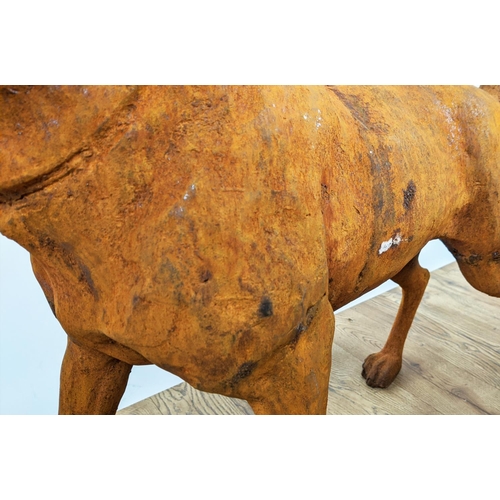 305 - CONTEMPORARY SCHOOL SCULPTURAL DOGS, a pair, cast metal, oxidised finish, 91cm x 21cm x 75cm. (2)