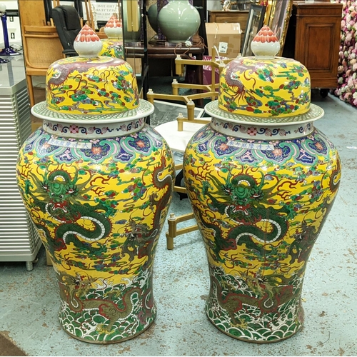 420 - TEMPLE JARS, a pair, with covers, glazed ceramic, 110cm H approx. (2)