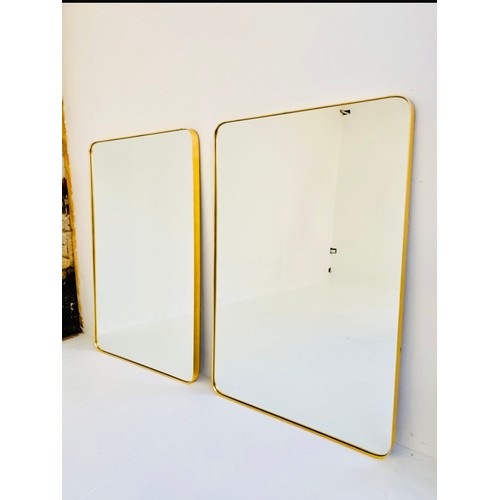 313 - WALL MIRRORS, a pair, 1960s French style, gilt frames, 120.5cm x 80.5cm. (2)