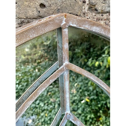 391 - ARCHITECTURAL GARDEN MIRRORS, a set of three, Gothic style frames, distressed finish. (3)