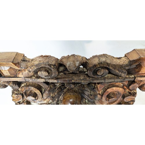 143 - WALL MOUNTED BRACKETS, a pair, hand carved in the Rococo style, with plinth tops supported by scroll... 