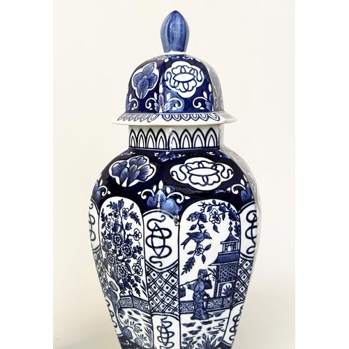 100 - TEMPLE VASES, a pair, Chinese blue and white ceramic, hexagonal facetted with lids, 63cm H. (2)