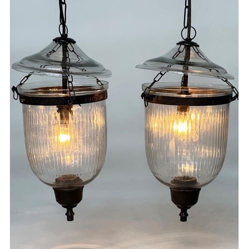 105 - BELL JAR HALL LANTERNS, a pair, glass reeded tapering and bronzed metal mounted, 58cm H x 34cm W. (2... 