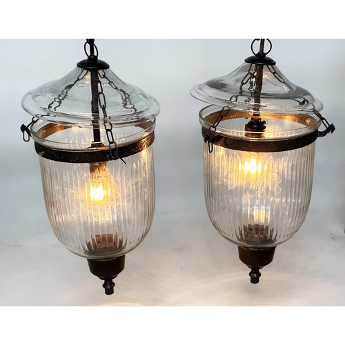 105 - BELL JAR HALL LANTERNS, a pair, glass reeded tapering and bronzed metal mounted, 58cm H x 34cm W. (2... 