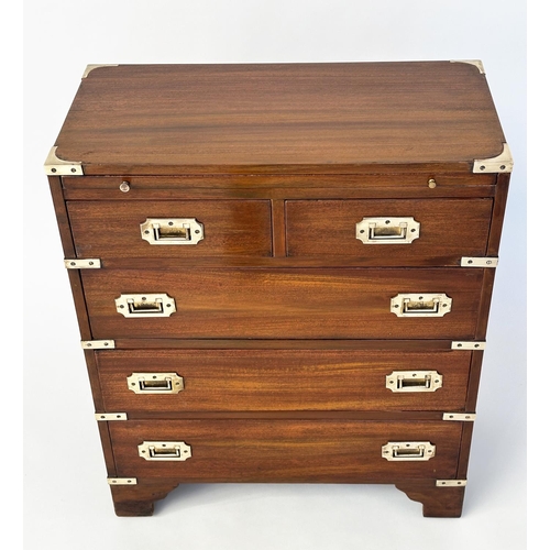 122 - CAMPAIGN STYLE CHESTS, a pair, mahogany and brass bound each with brushing slide above two short and... 