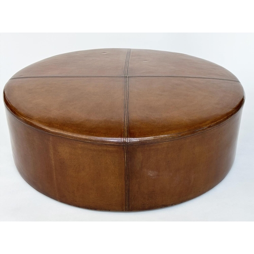 125 - CENTRE STOOL, circular stitched mid brown, natural leather with bun supports, 100cm W x 31cm H.