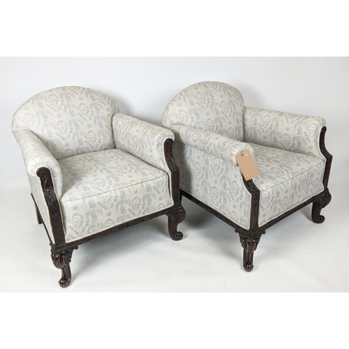 147 - ARMCHAIRS, a pair, each 74cm W x 78cm H, with carved showframe, in a patterned grey/blue fabric. (2)