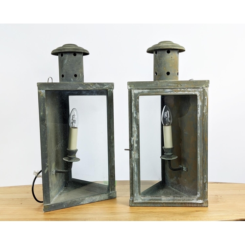 308 - WALL LANTERNS, a pair, aged metal and glass, 24.5cm x 21.5cm x 52cm approx each. (2)