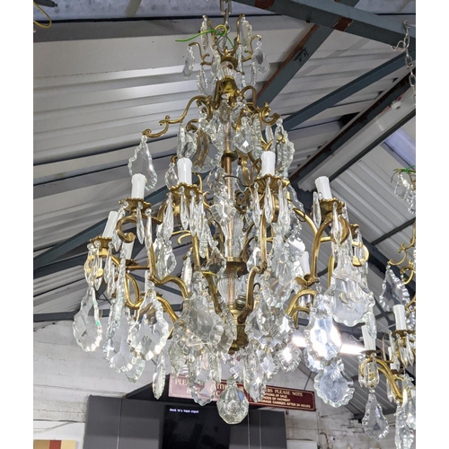 309 - CHANDELIERS, a near pair, each eighteen branch, cut glass, gilt metal, 100cm drop at largest. (2)