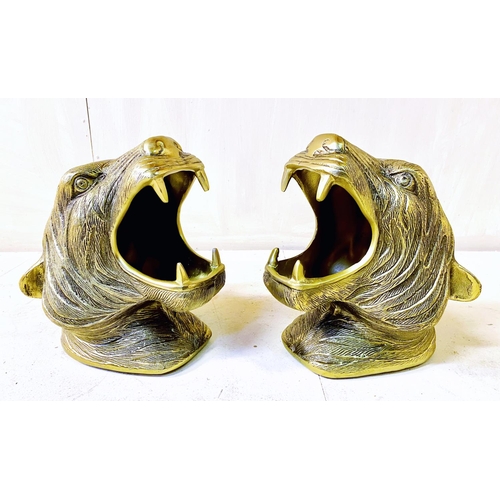 355 - TIGER HEAD BOTTLE HOLDERS, pair, in gilt metal, 30cm high, 22cm wide, 24cm deep. (2)