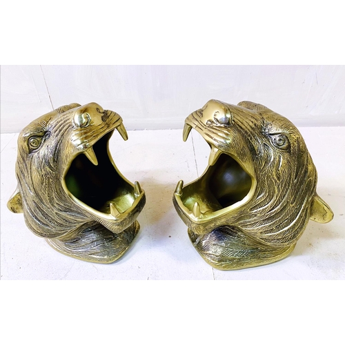 355 - TIGER HEAD BOTTLE HOLDERS, pair, in gilt metal, 30cm high, 22cm wide, 24cm deep. (2)