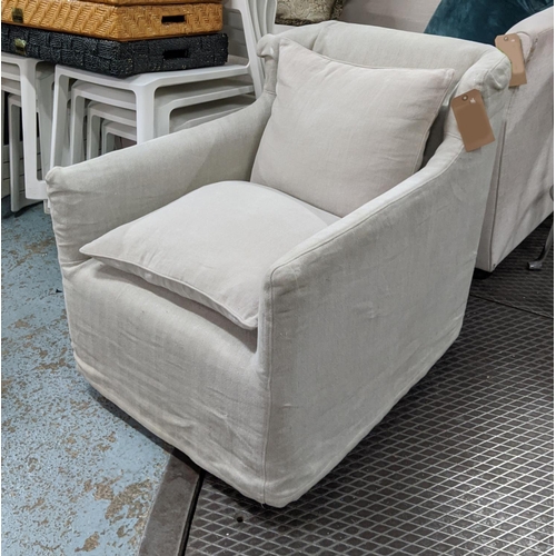 396 - OKA SWIVEL ARMCHAIR, in a loose cover, 68cm W x 77cm H.