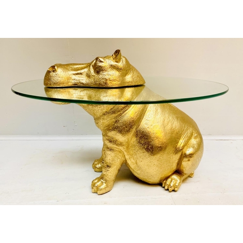 429 - HIPPOPOTAMUS LOW TABLE, gilt resin, glass top, 65cm x 45cm x 50cm.