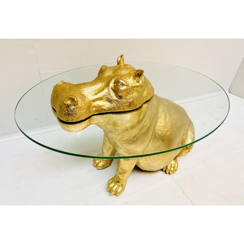 429 - HIPPOPOTAMUS LOW TABLE, gilt resin, glass top, 65cm x 45cm x 50cm.