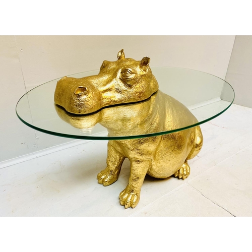 429 - HIPPOPOTAMUS LOW TABLE, gilt resin, glass top, 65cm x 45cm x 50cm.