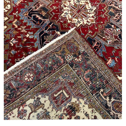 74 - VINTAGE PERSIAN HERIZ CARPET, 292cm x 214cm.