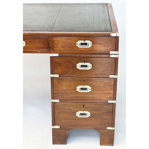 90 - CAMPAIGN STYLE DESK, mahogany and brass bound with tooled leather writing surface above nine drawers... 