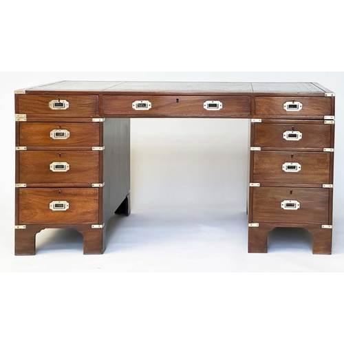 90 - CAMPAIGN STYLE DESK, mahogany and brass bound with tooled leather writing surface above nine drawers... 