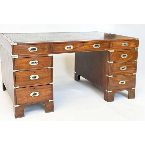 90 - CAMPAIGN STYLE DESK, mahogany and brass bound with tooled leather writing surface above nine drawers... 