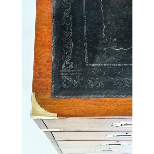 90 - CAMPAIGN STYLE DESK, mahogany and brass bound with tooled leather writing surface above nine drawers... 