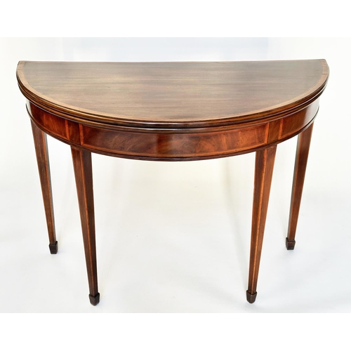 97 - CARD TABLE, George III figured mahogany and satinwood banded of demilune form, foldover baize-lined,... 