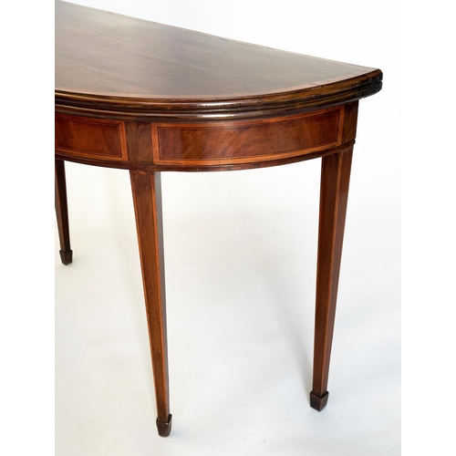 97 - CARD TABLE, George III figured mahogany and satinwood banded of demilune form, foldover baize-lined,... 