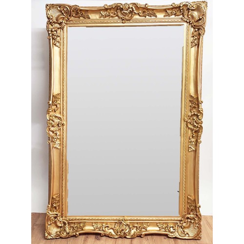 378 - WALL MIRROR, Continental style, gilt frame, bevelled plate, 184cm high, 120cm wide