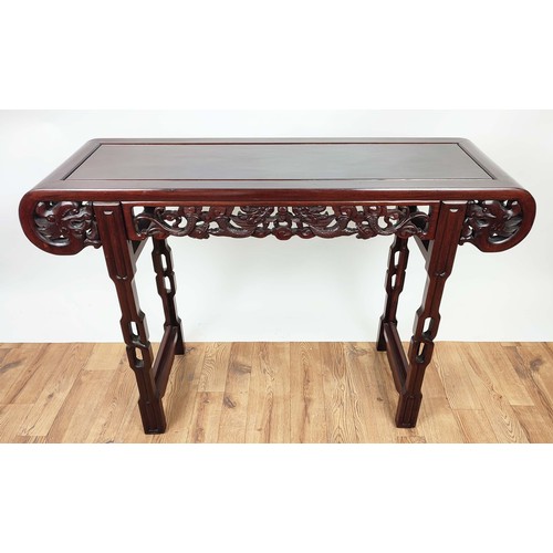 393 - CHINESE STYLE ALTER TABLE, 84cm high, 124cm wide, 40cm deep, scroll top with carved and pierced frie... 