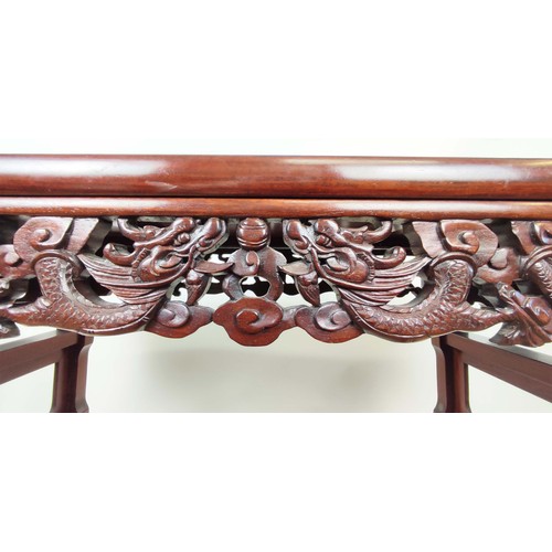 393 - CHINESE STYLE ALTER TABLE, 84cm high, 124cm wide, 40cm deep, scroll top with carved and pierced frie... 