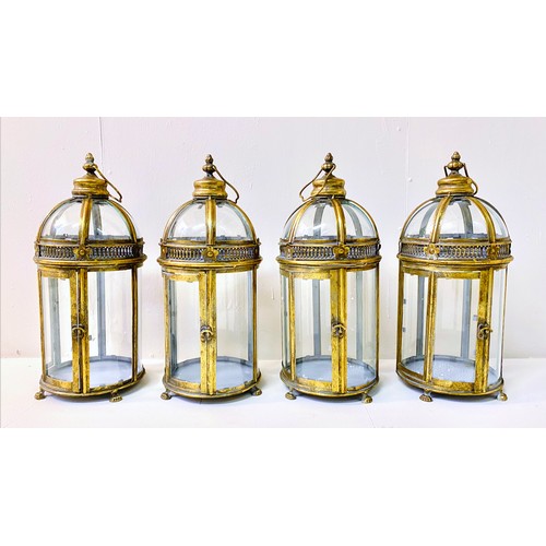 362 - STORM LANTERNS, a set of four, Regency style, gilt metal, 46cm H x 19cm diam. (4)