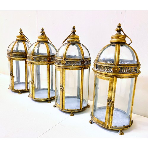 362 - STORM LANTERNS, a set of four, Regency style, gilt metal, 46cm H x 19cm diam. (4)