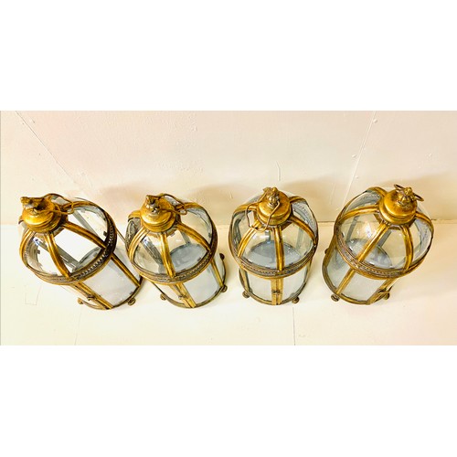 362 - STORM LANTERNS, a set of four, Regency style, gilt metal, 46cm H x 19cm diam. (4)