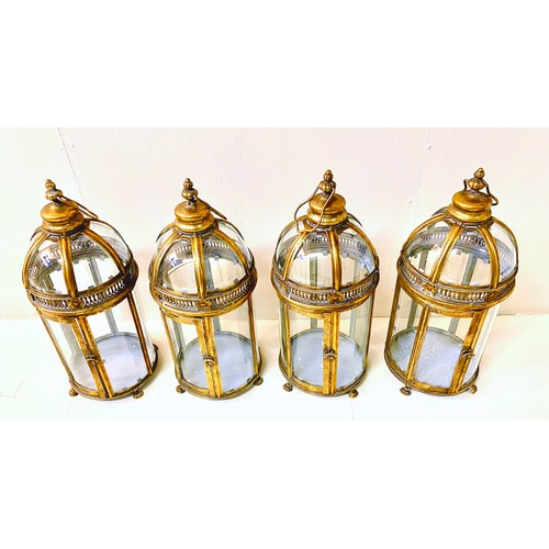 362 - STORM LANTERNS, a set of four, Regency style, gilt metal, 46cm H x 19cm diam. (4)