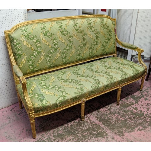 140 - LOUIS XVI STYLE GILTWOOD CANAPE, 19th century gilt gesso applied decoration, green silk floral patte... 