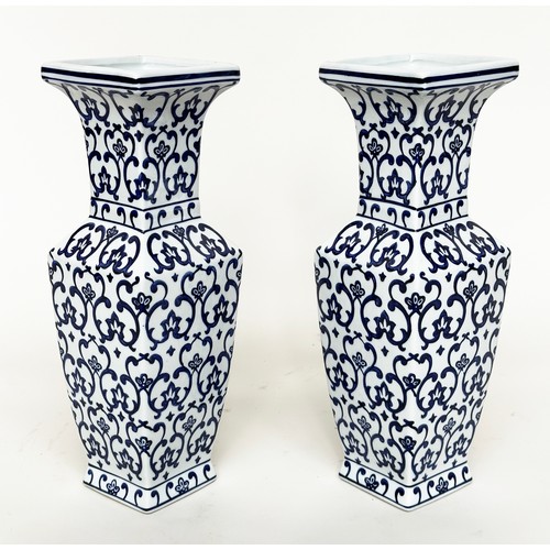 125 - VASES, a pair, Chinese ceramic blue and white of facetted form and mosaic patterned, 40cm H. (2)