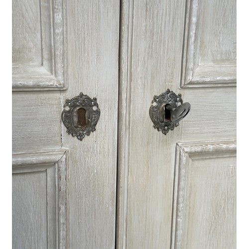 137 - ARMOIRE, French style traditionally grey painted with two panelled doors, enclosing hanging space ab... 