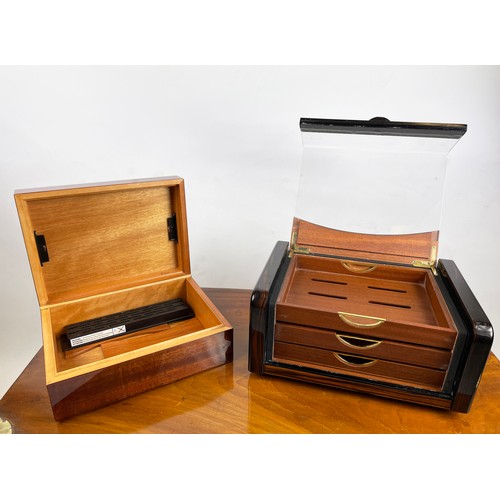 2 - HUMIDORS, two, one Italian in Macassar with glass hinged lid and three trays, the other mahogany. (2... 